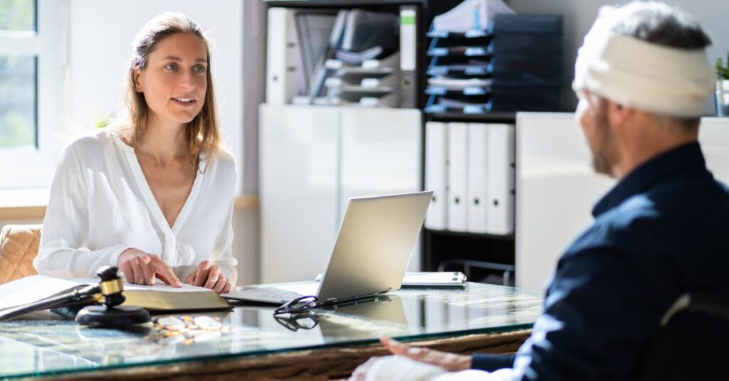 Lawyer speaking with injured client