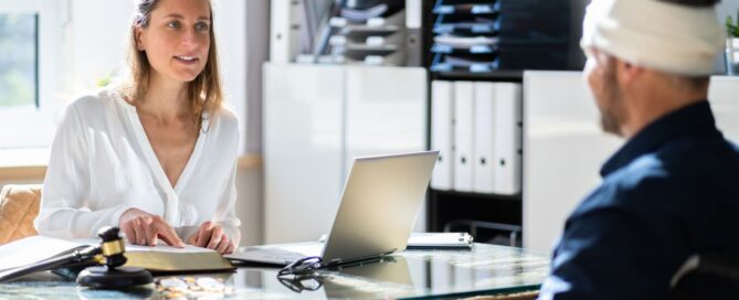 Lawyer speaking with injured client