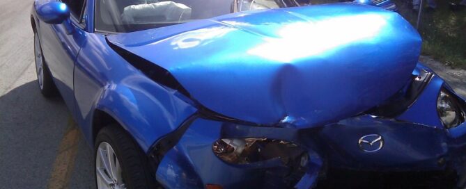 Hit and Run accident that left a car's front end damaged